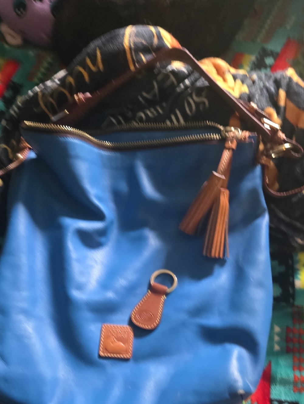 Dooney & Bourke With Dust Bag.  Blue Leather Tote with Brown Trim